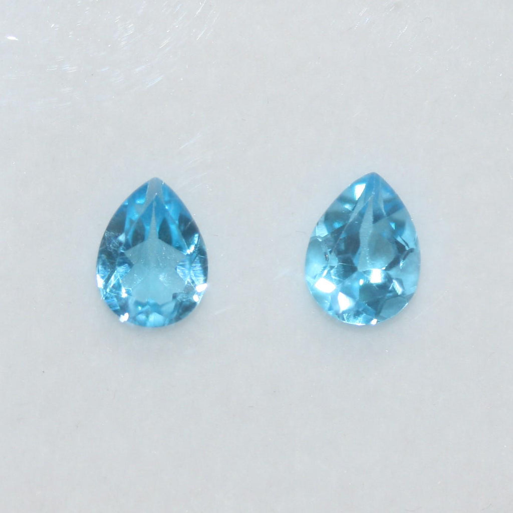 Lote de 2 piezas de topacio azul suizo facetado, 10 x 7 mm. (2 piezas)