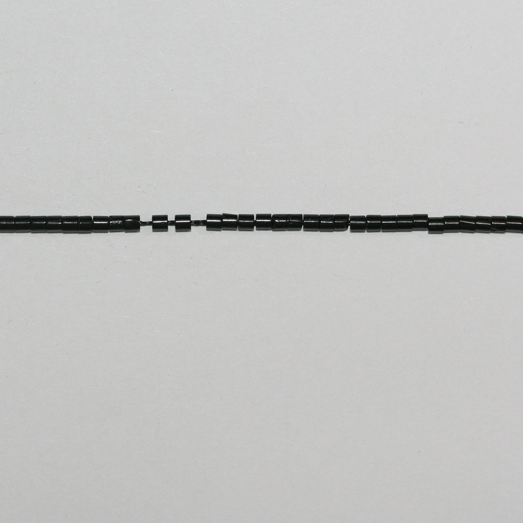 Perles disques lisses St Jet 15" 2x1,5mm.-Bracelet 39cm.