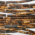 Perles tubulaires lisses œil de tigre St 15" 13x4mm.-Rig 39cm.