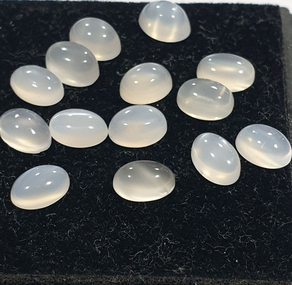 14 Pcs Lot White Moonstone Oval Cabochon 6x4mm. (14 pcs.)