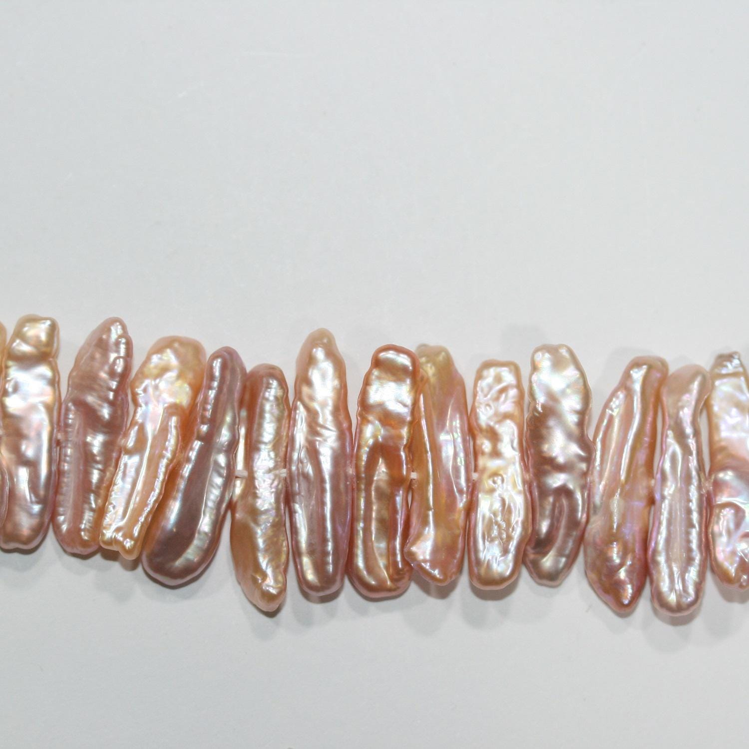 Perles de saumon Biwas d'eau douce St, 16 pouces (environ 40 cm), 23 x 6 mm, longueur 40 cm. Perles naturelles à prix de gros.