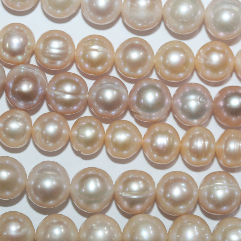 Perles de saumon d'eau douce rondes de 15 pouces (10-11 mm) - Fil de 39 cm. - Perles naturelles à prix de gros.