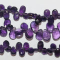 Cuentas de amatista facetadas de 8" x 7 x 5 mm (aprox.), hilo de 20 mm.