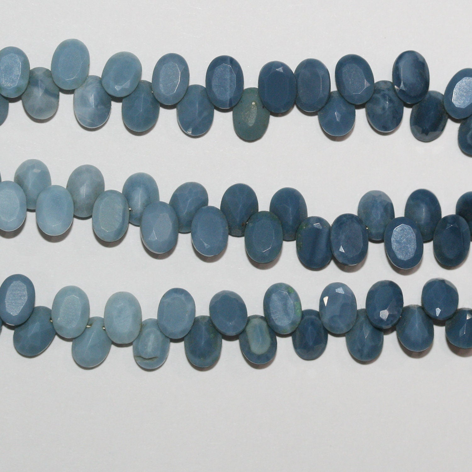 Perles ovales à facettes en opale bleue St 9" (7 x 5 mm) - Fil de 21 cm