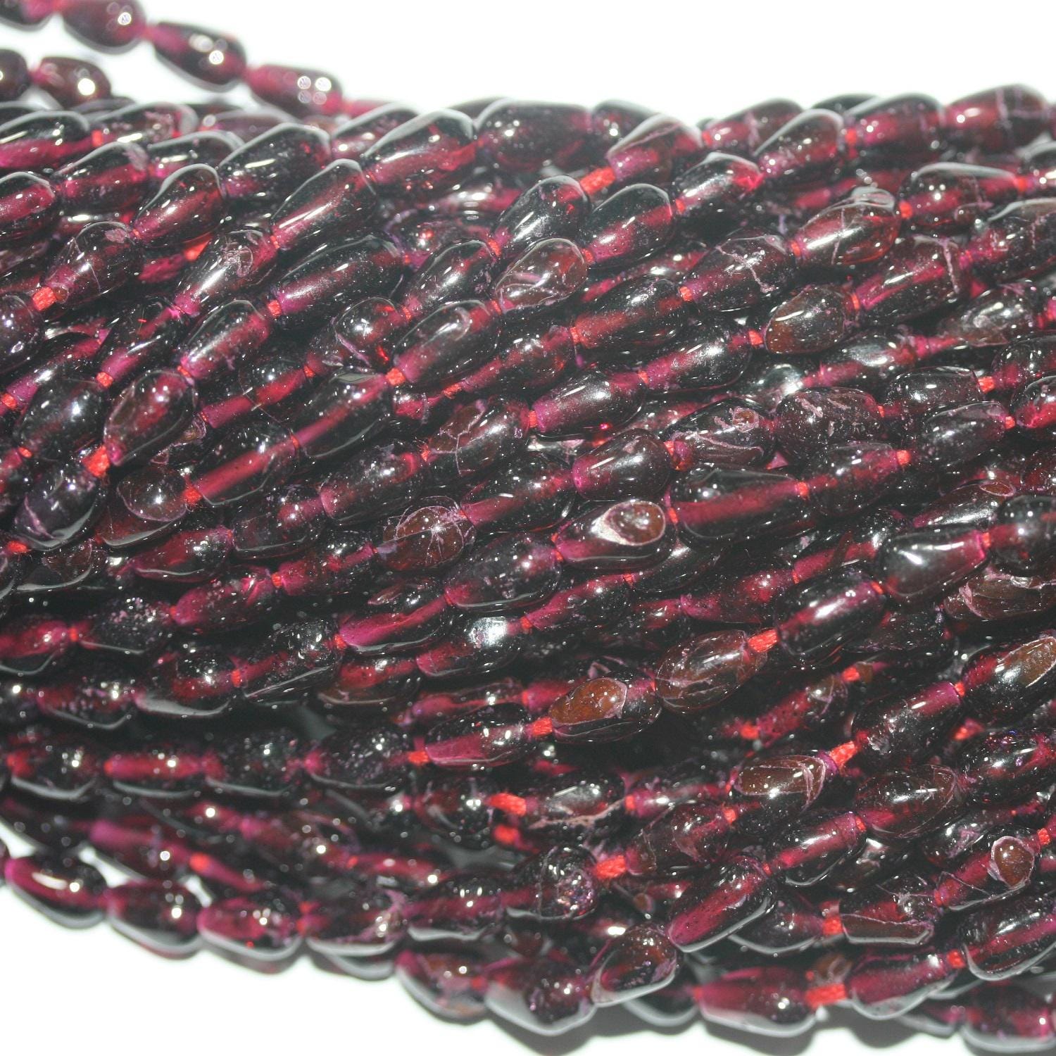 14" St Garnet Smooth Drop Beads 8x5mm. Approx -Strand 36cm