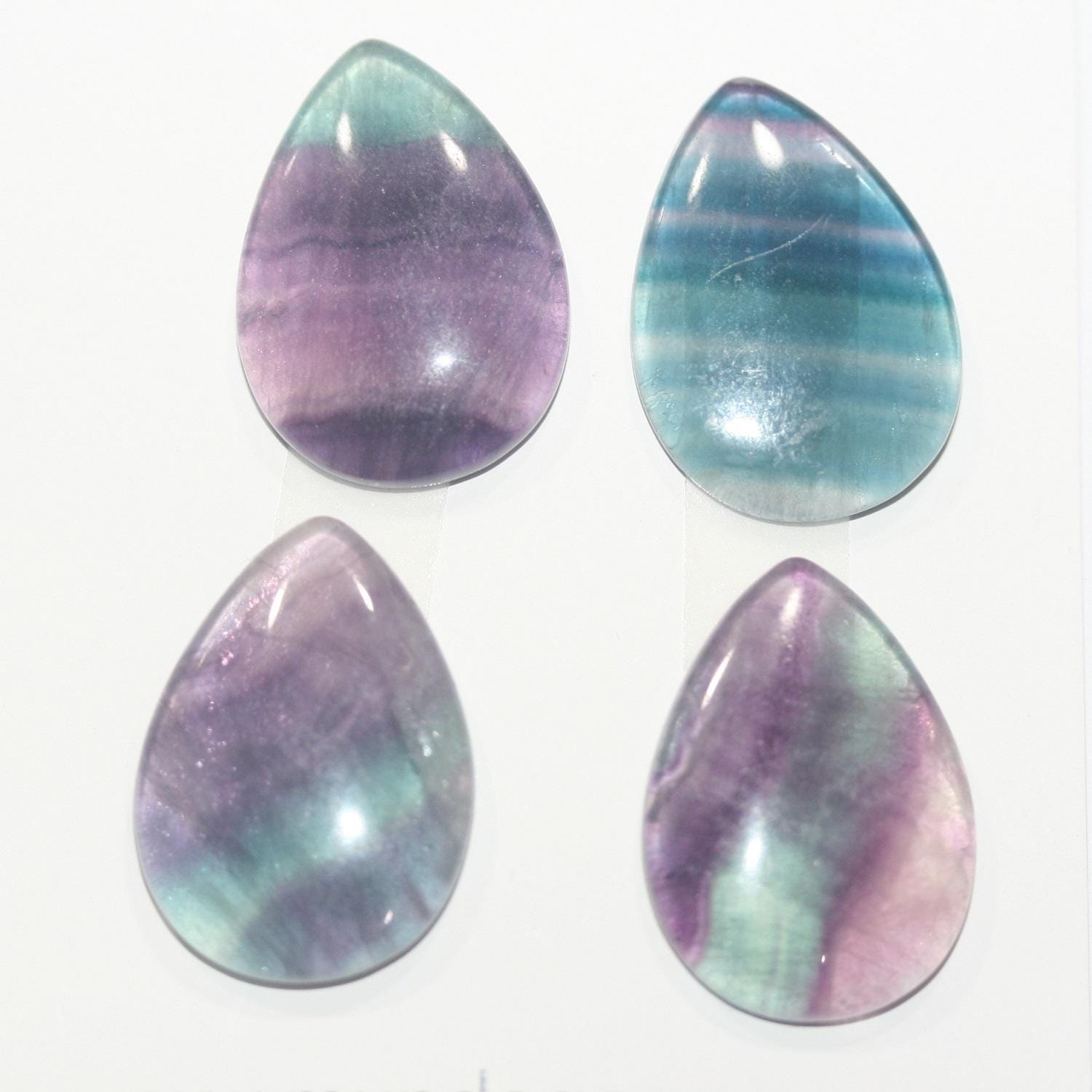 Lote de 4 cabujones lisos de fluorita (4 piezas) 25 x 18 mm.