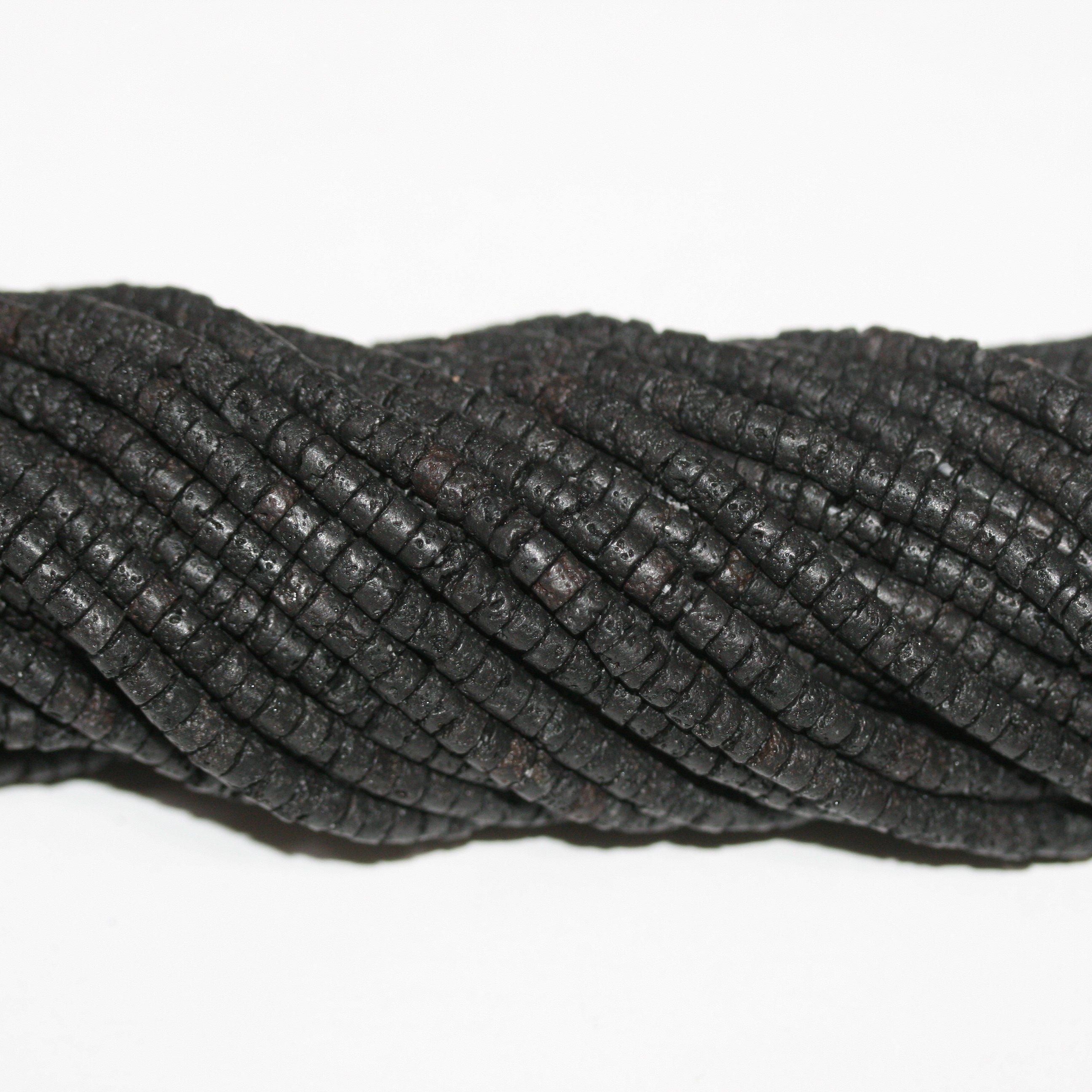 Perles rondelles lisses St. Lava 15" 4x2mm.- Brin 39cm.