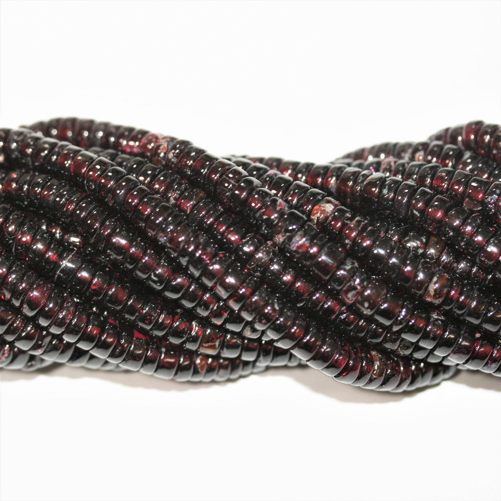 13" St Garnet Smooth Disc Beads 5x2mm.- Strand 33cm.