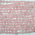 Perles de quartz rose St. Rose lisses en pépites de 15 pouces (6-8 mm). Longueur approximative du brin : 39 cm.