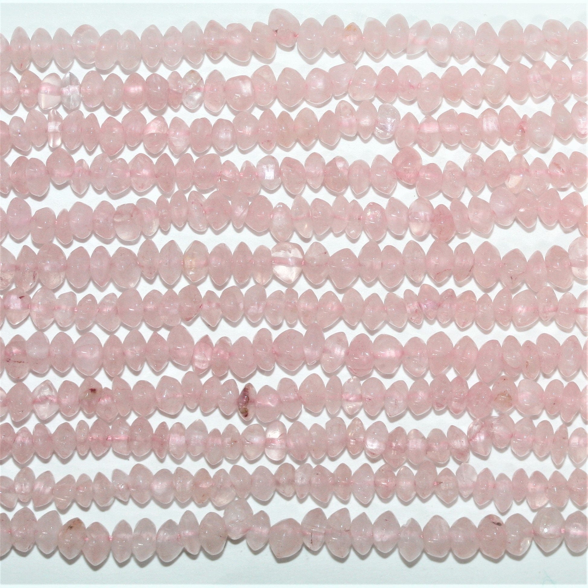 Perles rondelles lisses en quartz rose 4x2mm - Fil de 36cm.