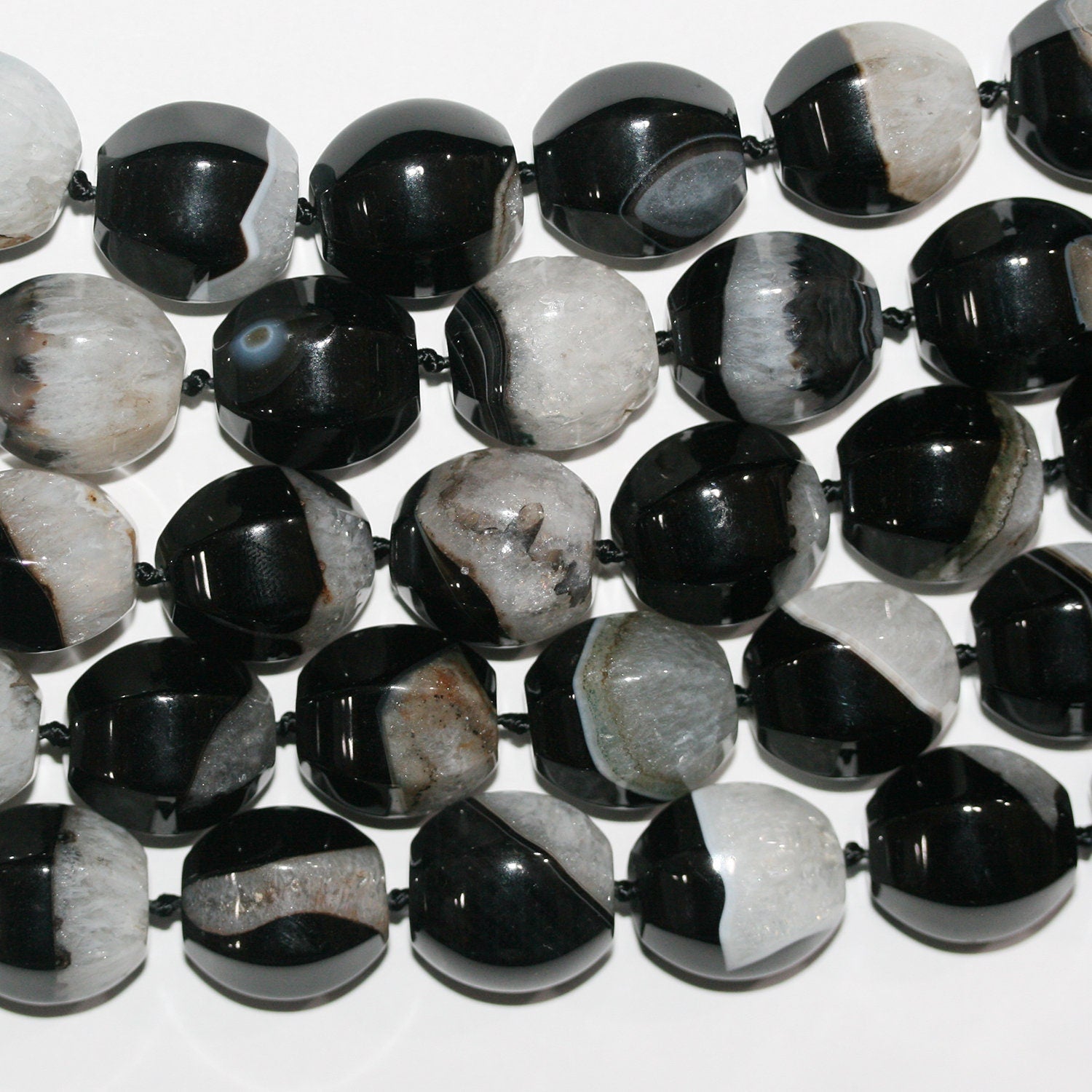 Cuentas de barril facetadas de ónix en bandas de 16" de 19 x 16 mm, hilo de 40 cm.