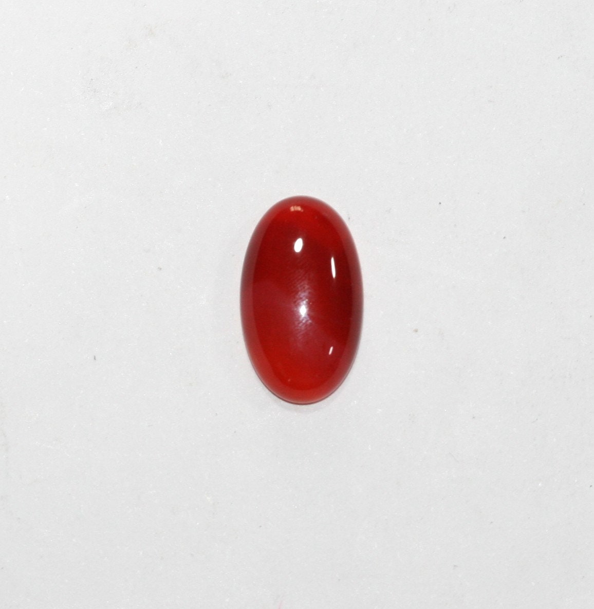 Lote de 4 cabujones ovalados lisos de ágata roja de 20 x 12 mm.