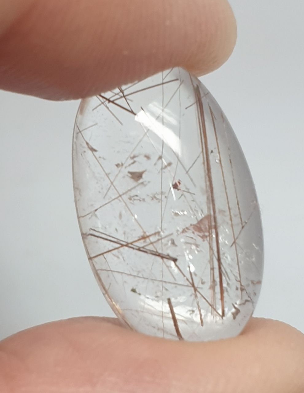 Rutilated Quartz Smooth Oval Cabochon 22.5x13.4mm. (14.3ct.)