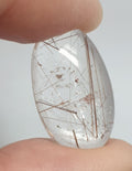 Rutilated Quartz Smooth Oval Cabochon 22.5x13.4mm. (14.3ct.)