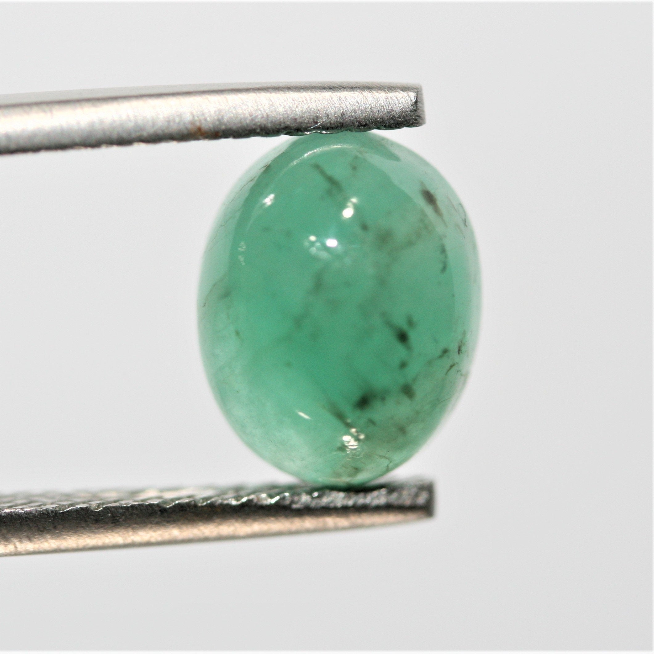 Emerald Smooth Oval Cabochon 10.2x8mm. (3ct.)