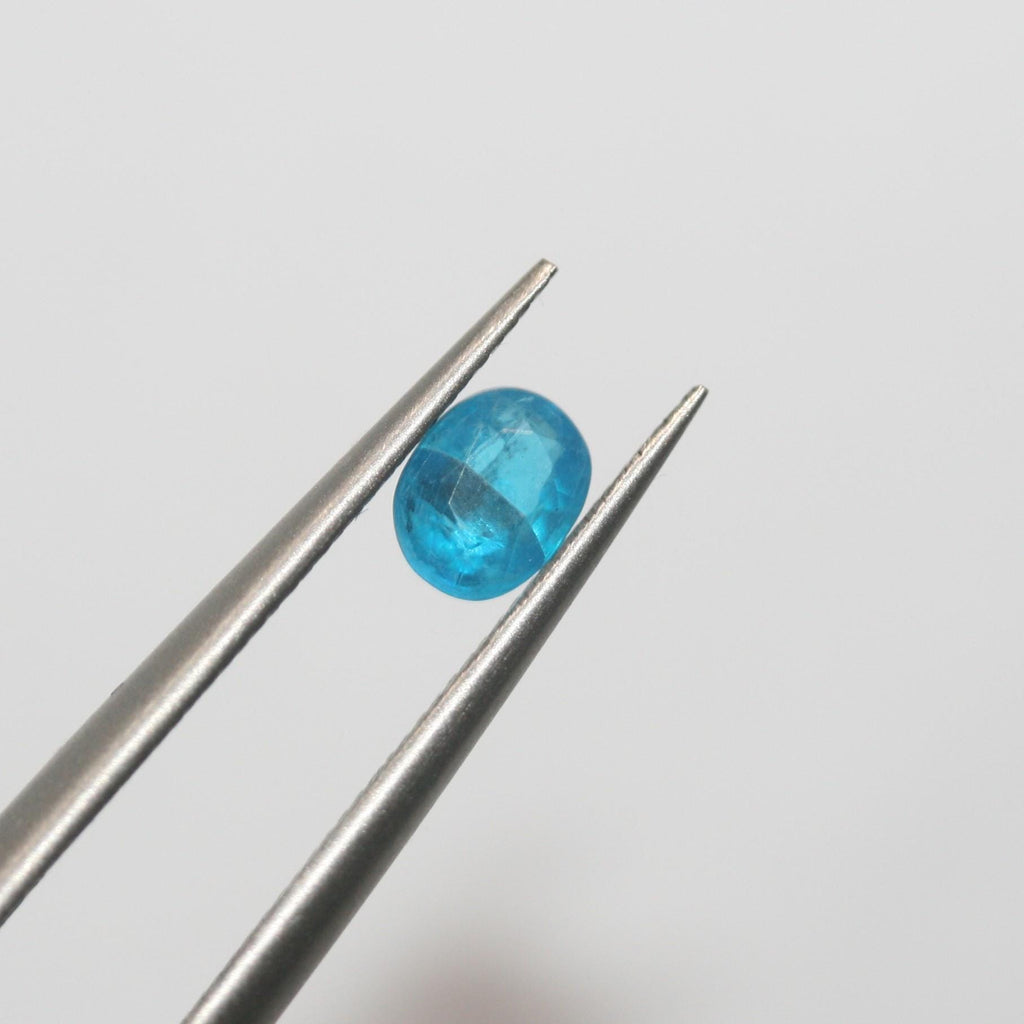 Lot de 2 pierres précieuses ovales à facettes bleu néon 5x4 mm - Prix de gros