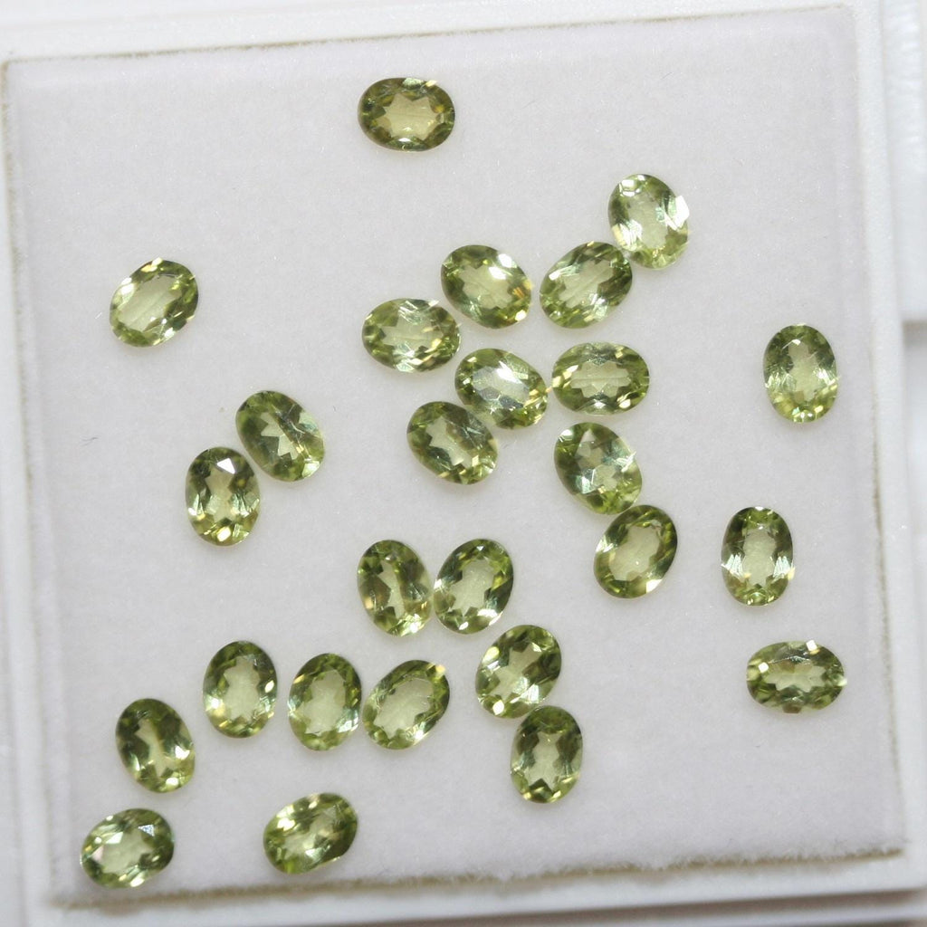 Lot de péridots ovales à facettes 4x3mm (5CT)