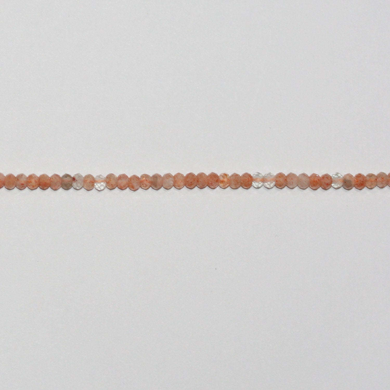 Perles rondelles à facettes en pierre de soleil St 15" 3x2mm.-Rig 39cm.