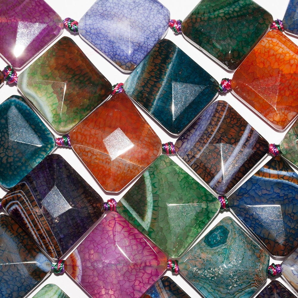 Cuentas de ágata multicolor facetadas con diamantes de 17" de 22 mm. Tira de 42 cm.