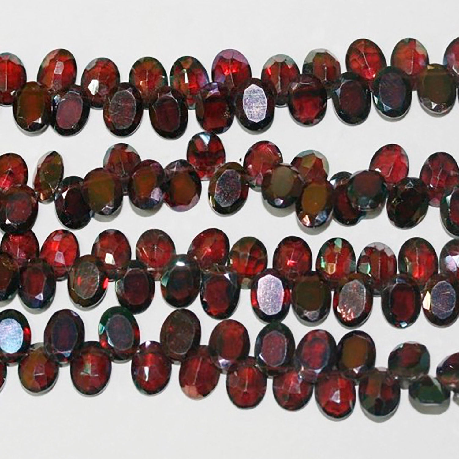 Perles ovales à facettes en grenat mystique St (8 x 6 mm) - Fil de 21 cm
