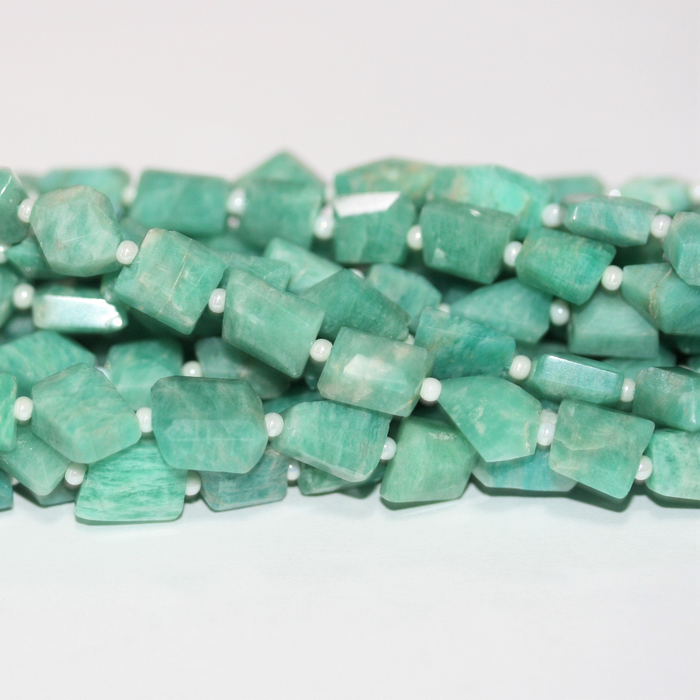 14" St Amazonite Faceted Nugget 8x6mm.Approx.-Strand 35cm.