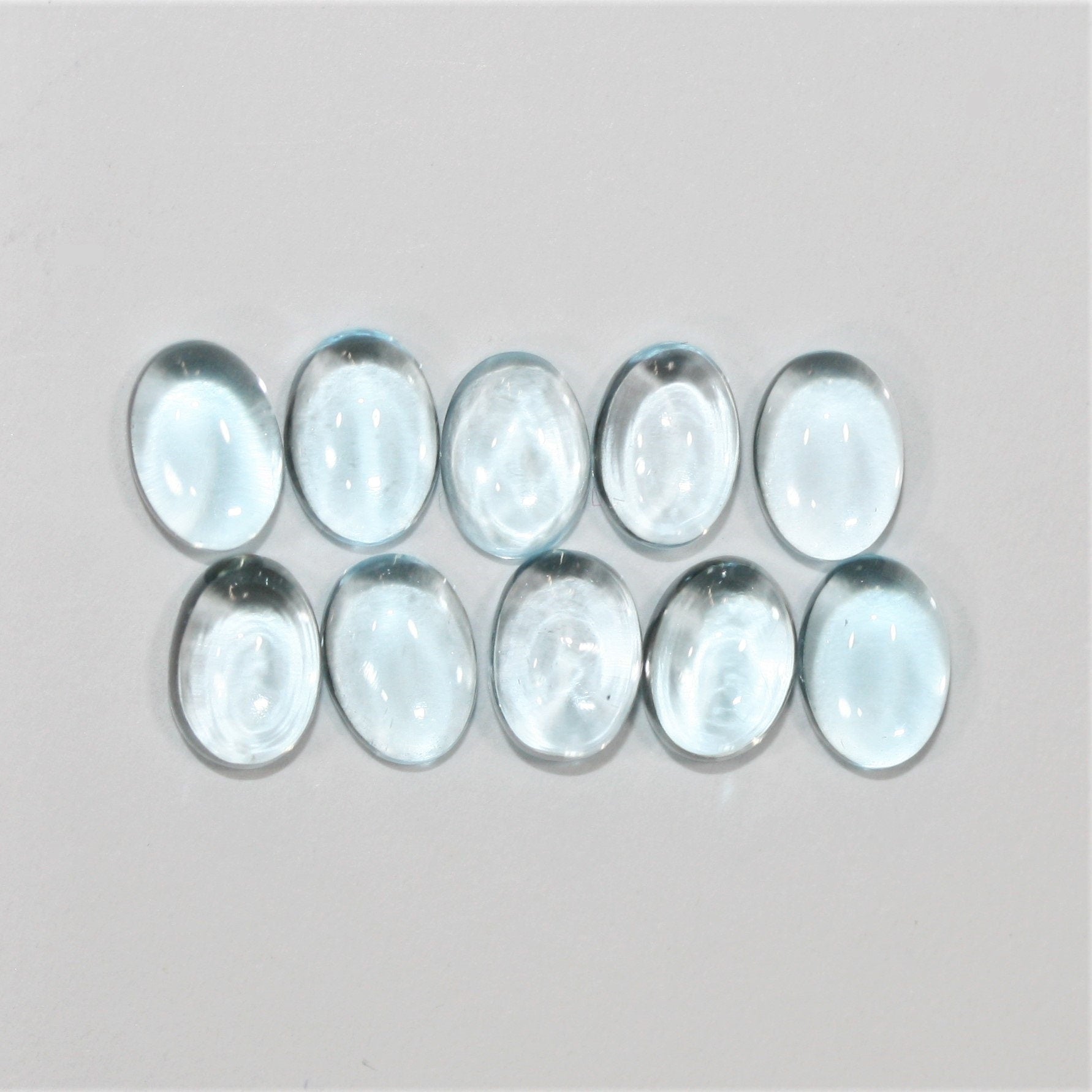 Sky Blue Topaz Smooth Oval Cabochons Lot 7x5mm.- 10 Pieces