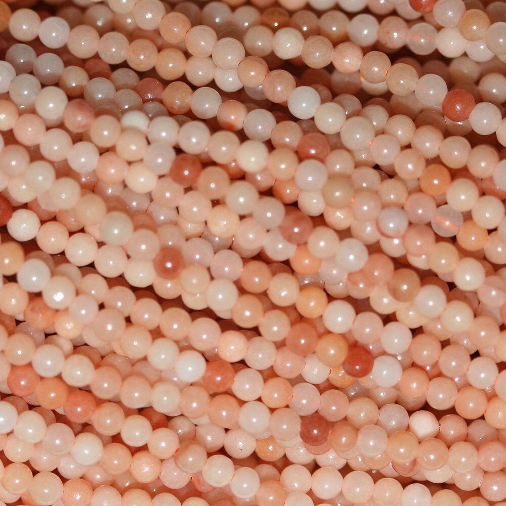 Brin de 15 pouces de perles rondes en aventurine brune de 2 mm.