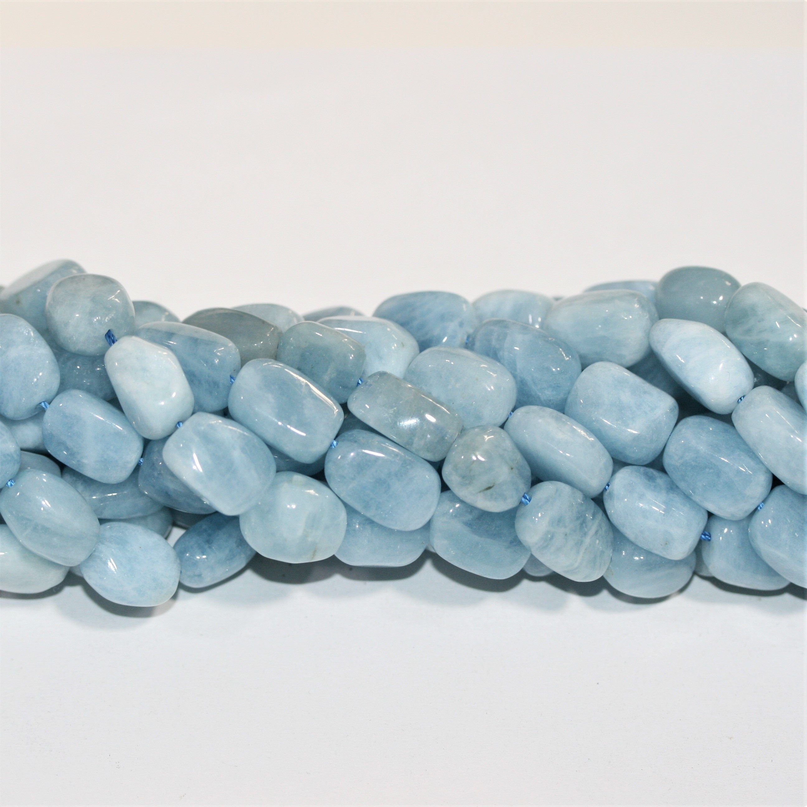 Cuentas ovaladas lisas de aguamarina Santa de 16" (16 x 11 mm). Aprox. - Hilo de 40 cm.