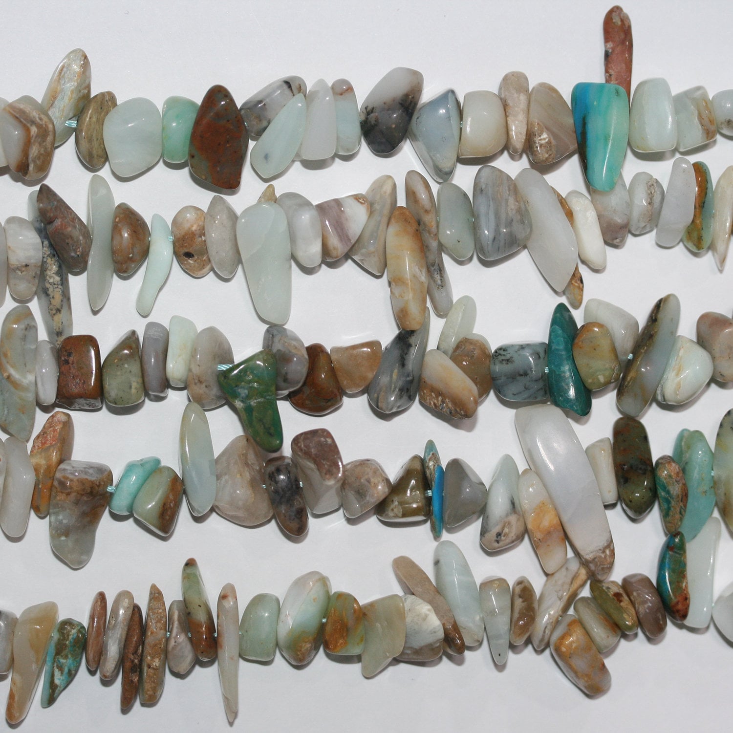 Cuentas lisas de ópalo peruano de 16", 10-14 mm. Aprox. - Hilo de 40 cm.