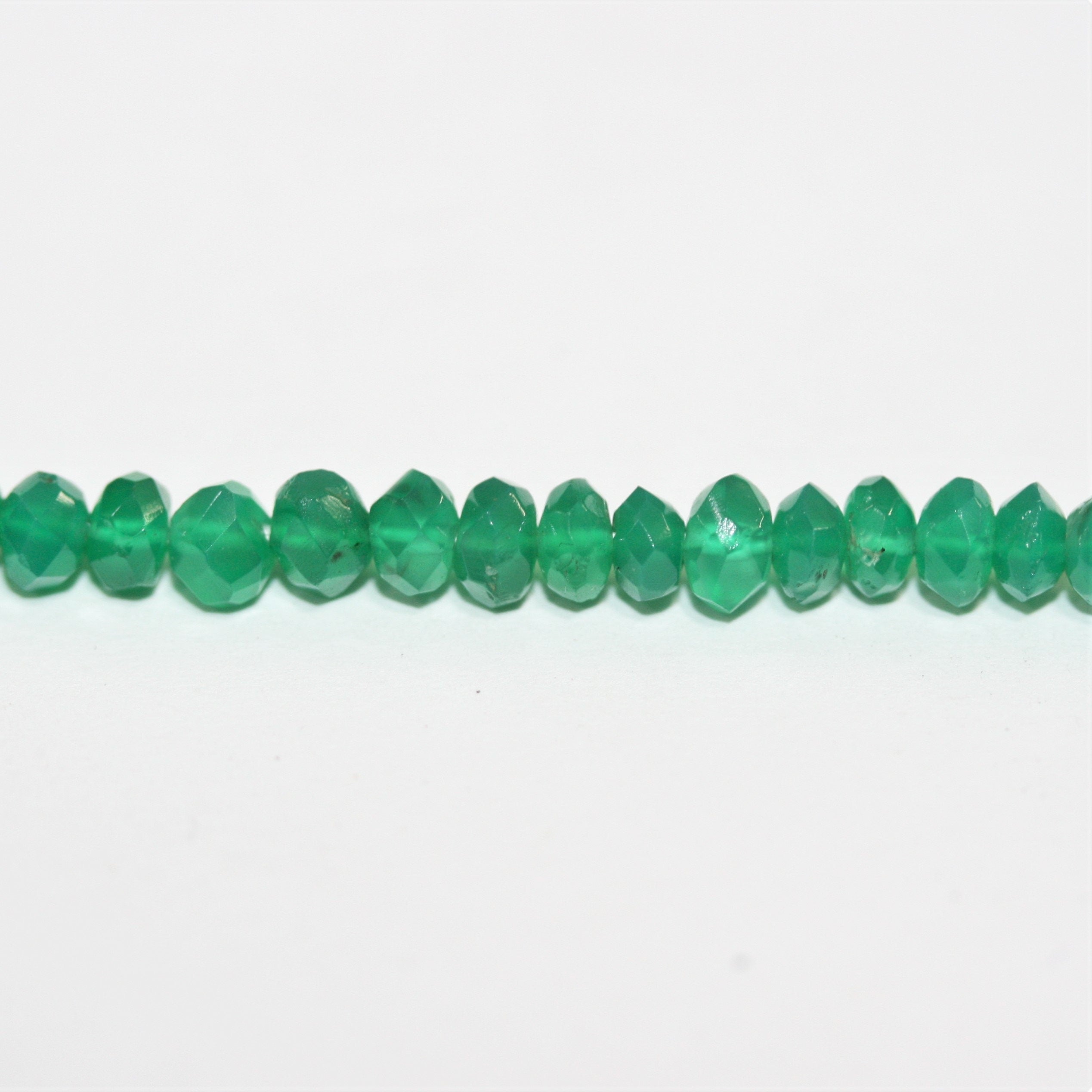 Perles rondelles à facettes en onyx vert 4x3mm.-Rig 37cm.
