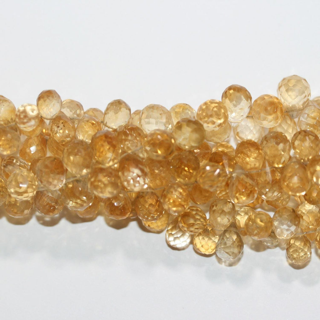 Perles en citrine facettées en forme de goutte, 7 x 5 mm environ, 20 cm de long.
