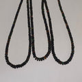 Cuentas redondas lisas graduadas de ópalo etíope negro de 17", 4 x 2 - 5 x 2,5 mm, hilo de 42 cm.