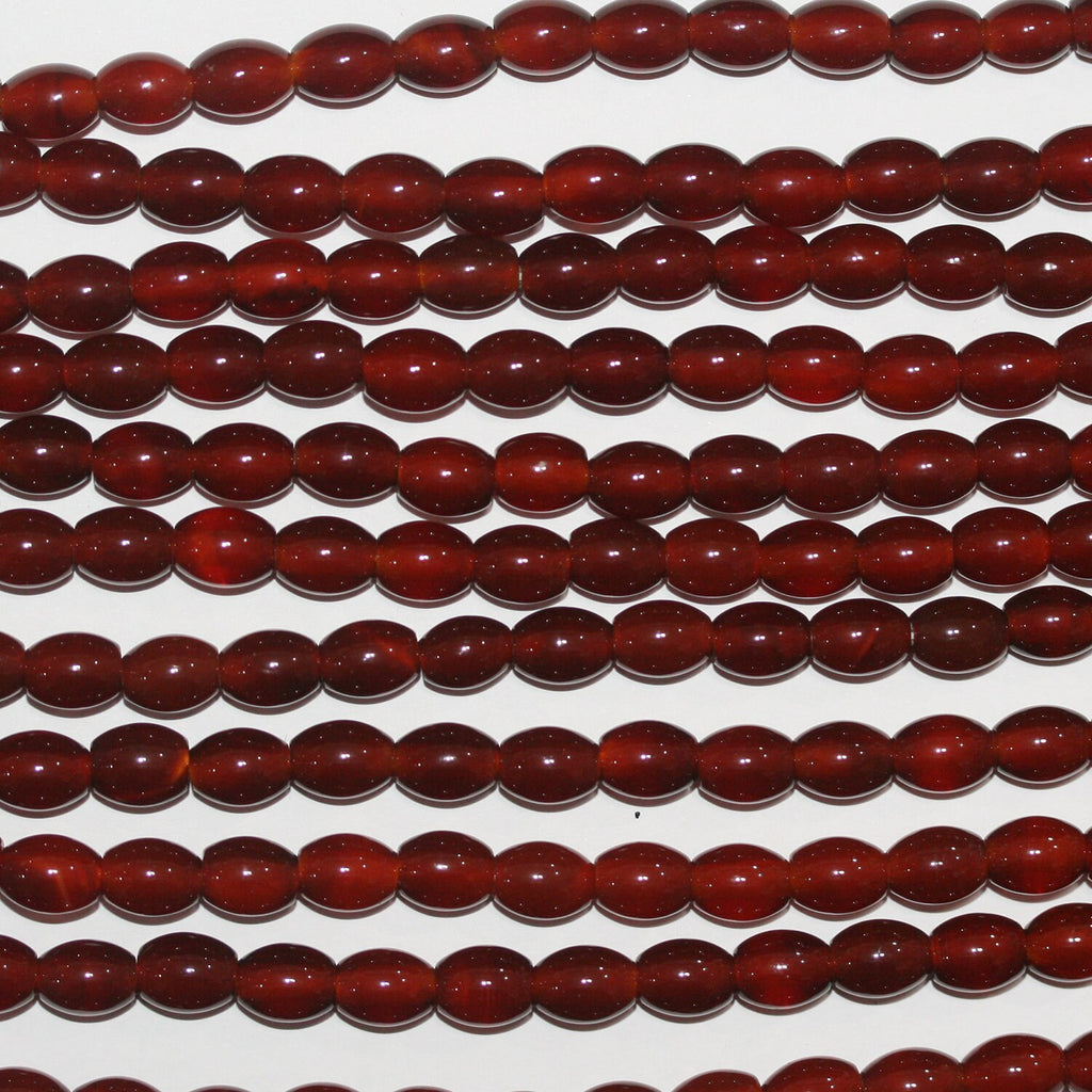 16" Cuentas de barril liso de Santa Cornalina 8x6 mm.-Hilo 40 cm.