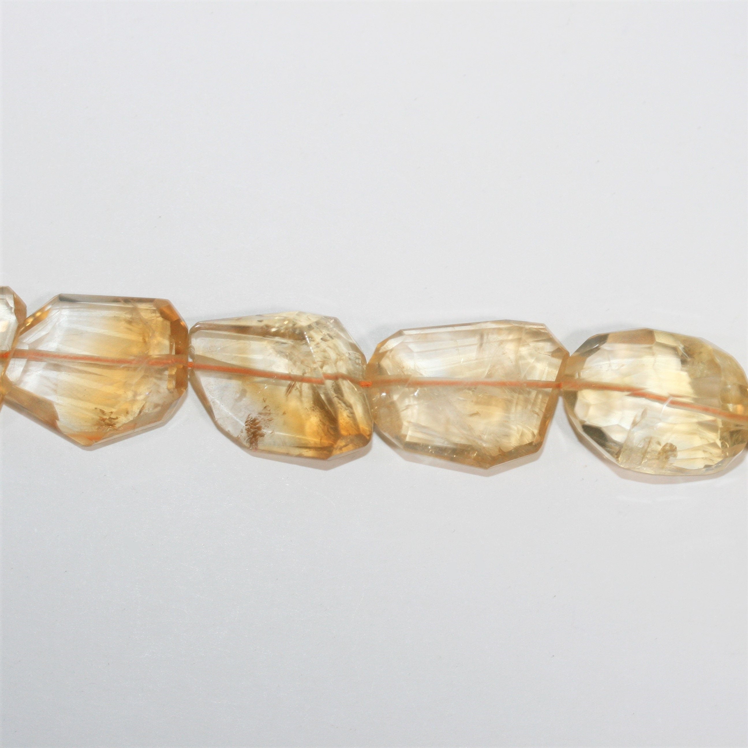 13" St Citrine Faceted Nugget Beads 13-23mm. Approx.- Strand 34cm.