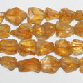 Perles de citrine St non polies, 13-18 mm environ - Longueur du fil : 38 cm