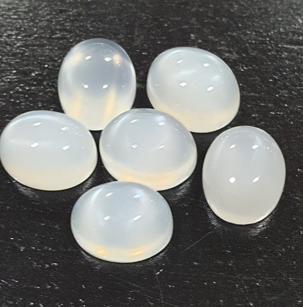 Lote de 6 cabujones ovalados de piedra lunar blanca de 11 x 9 mm. (6 uds.)