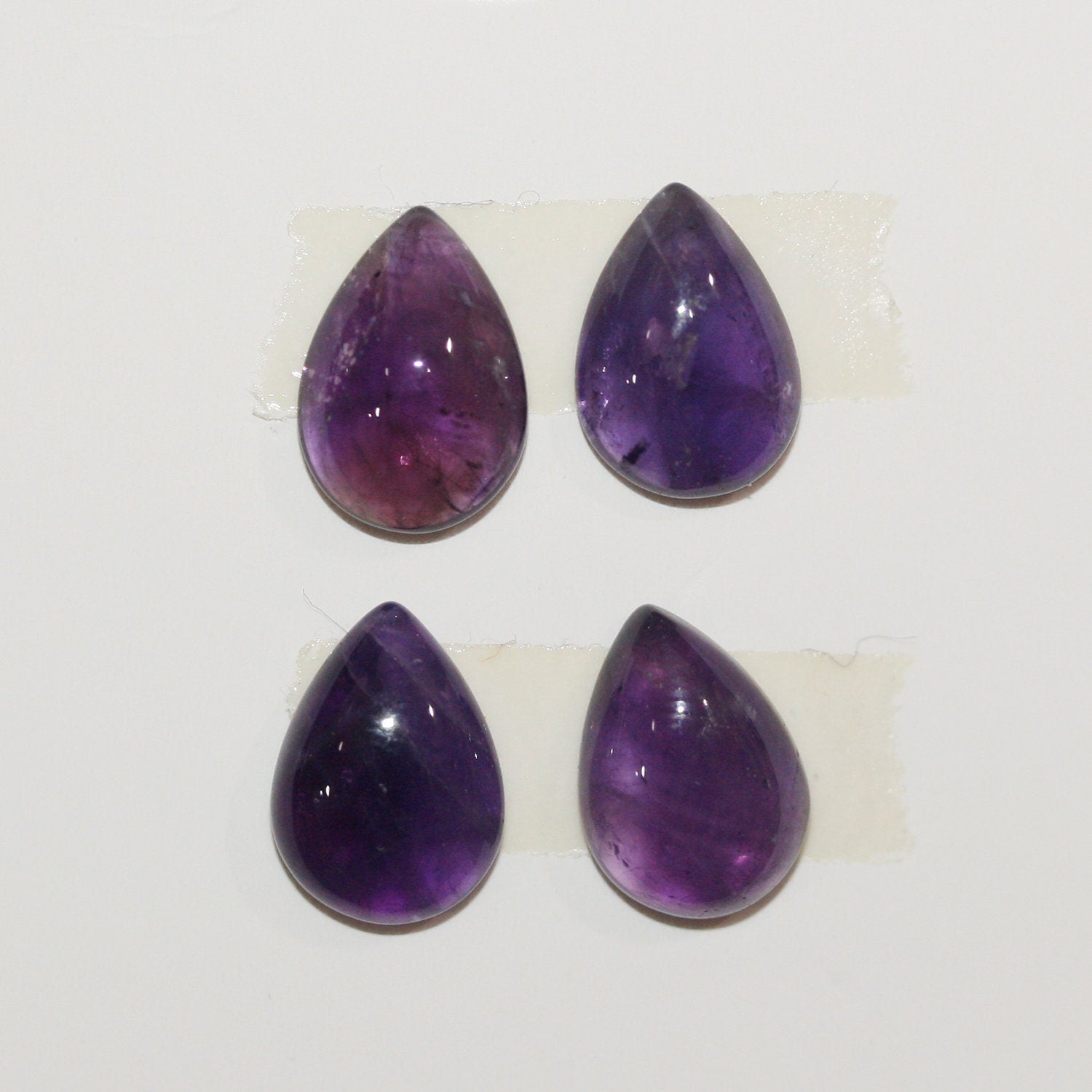 Lote de 4 cabujones de amatista lisos de 12 x 8 mm. (4 piezas)