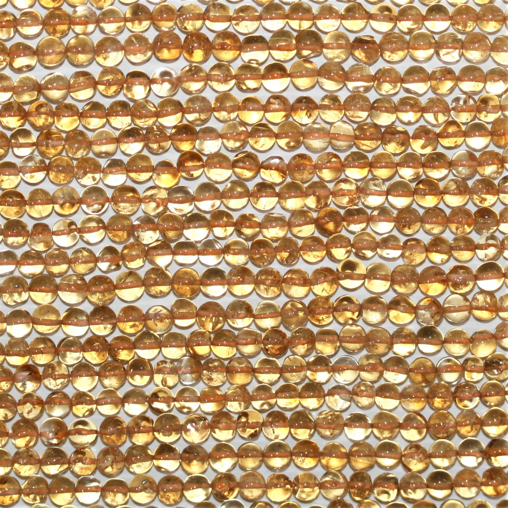 Perles rondes lisses de citrine 4 mm - Fil de 38 cm.