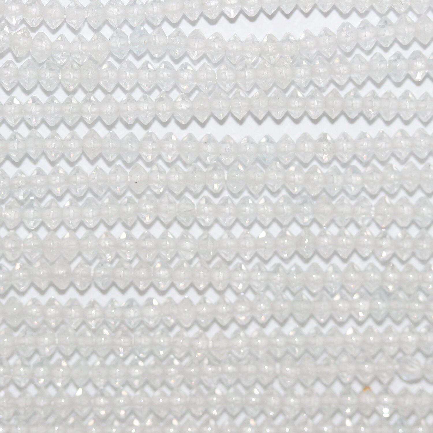 Perles rondelles à facettes en topaze blanche St 15" 3x2mm.-Rig 39cm.