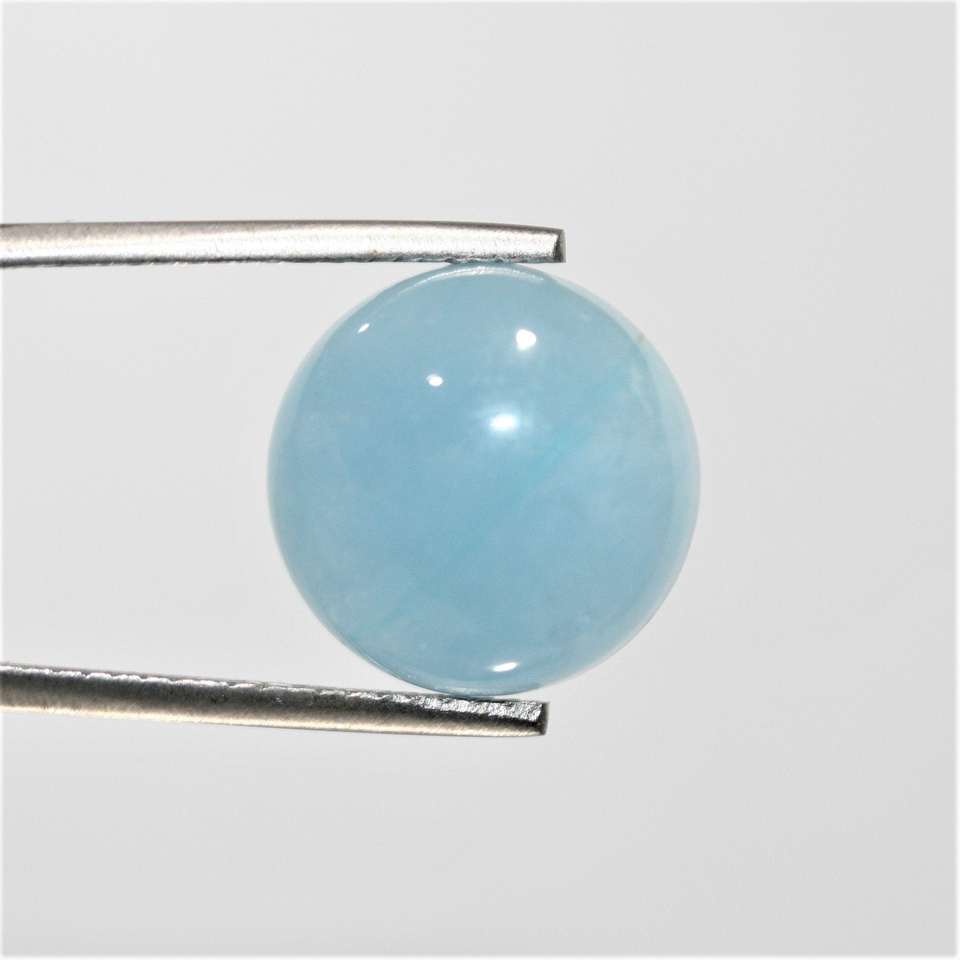 Pair of Aquamarine Smooth Round Cabochon 15mm. (2 pieces).