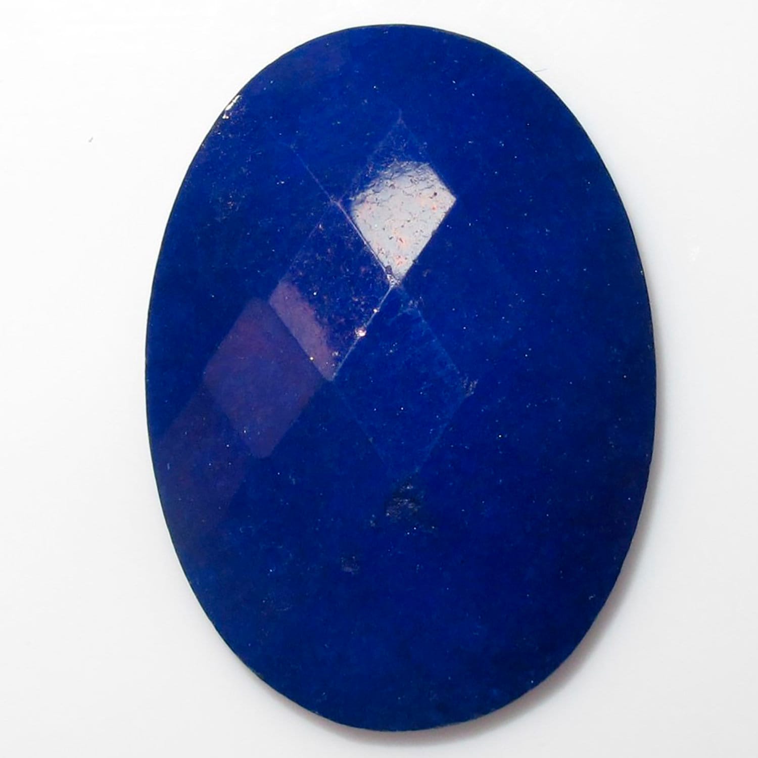 Lote de 4 cabujones facetados ovalados de jade teñido azul de 25 x 18 mm. (4 piezas)