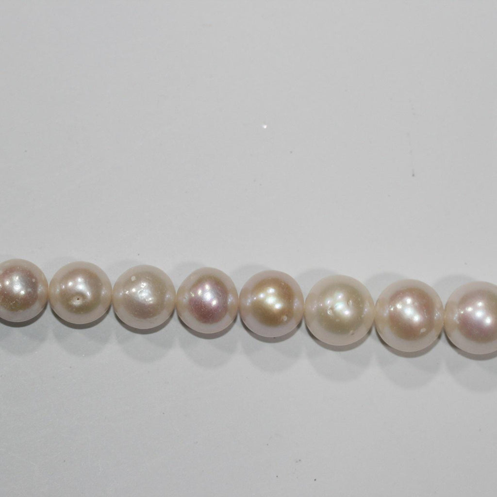 Perles rondes d'eau douce dégradées de 12 à 15 mm, 40 cm de long. Collier de 40 cm. Perles naturelles à prix de gros.