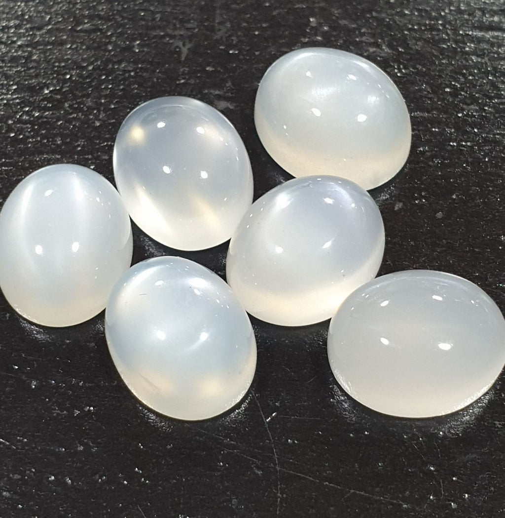 Lote de 6 cabujones ovalados de piedra lunar blanca de 11 x 9 mm. (6 uds.)