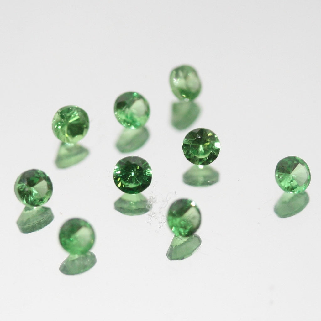 Lote de 9 granates tsavorita redondos facetados de 2-2,2 mm. - Paquetes de piedras preciosas - Piedras sueltas al por mayor