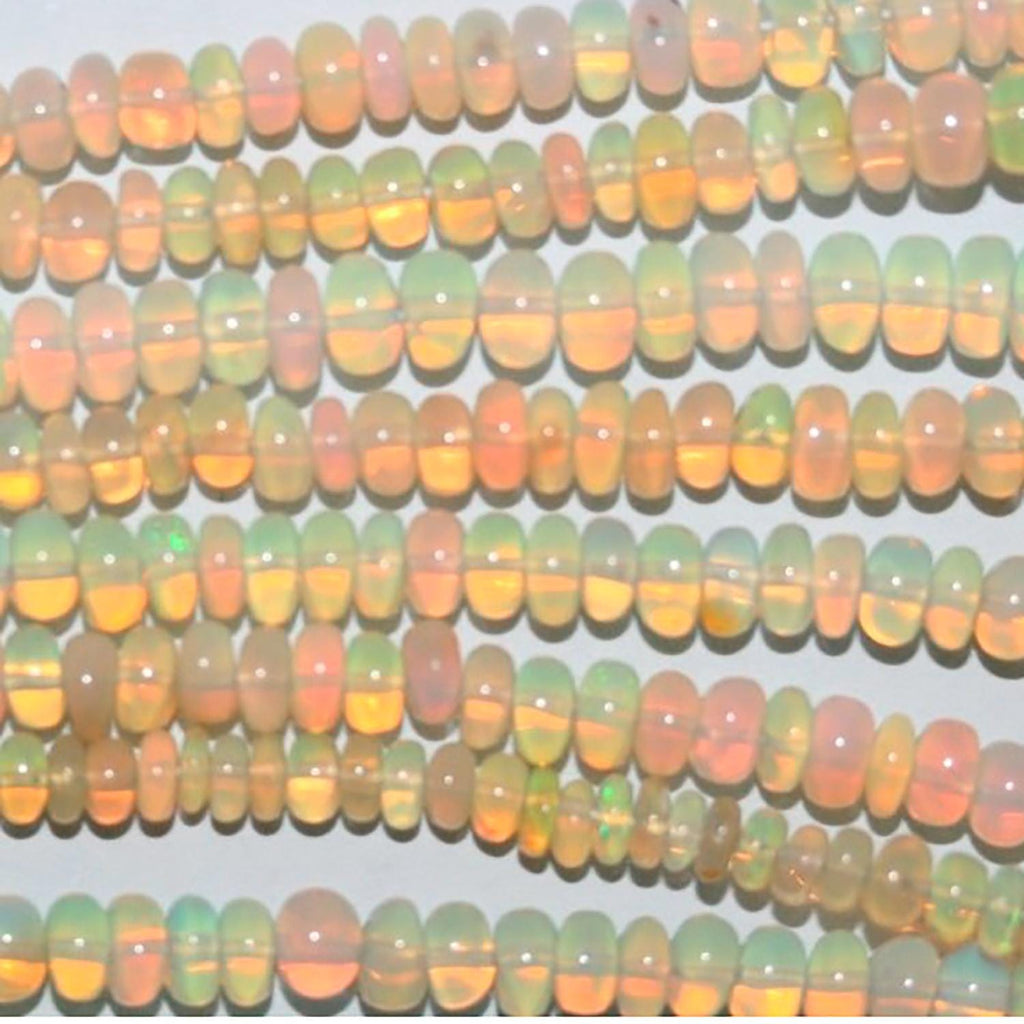 Perles rondelles lisses et graduées en opale éthiopienne St, 40 cm (16 pouces), dimensions : 3 x 2 à 6 x 3 mm. Longueur du fil : environ 40 cm.