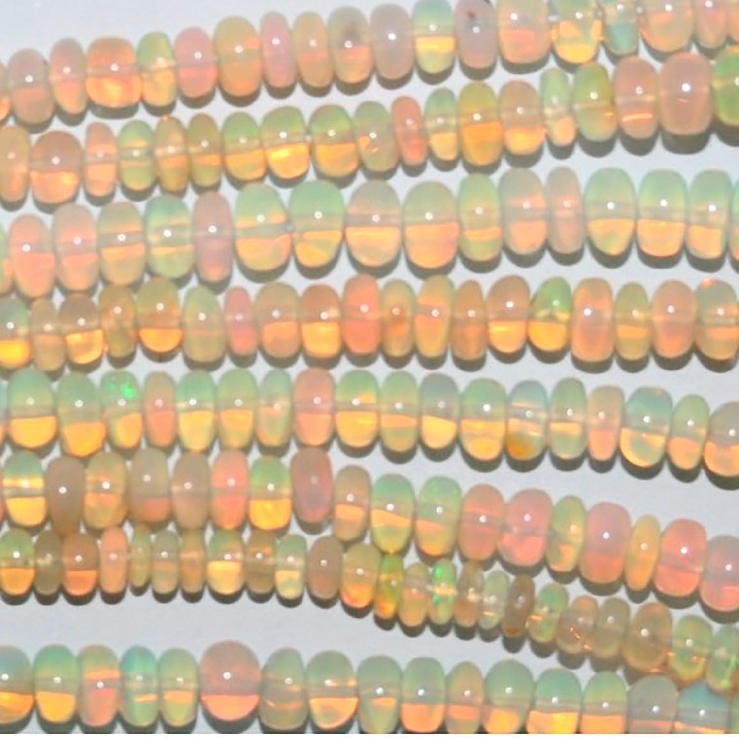 Perles rondelles lisses et graduées en opale éthiopienne St, 40 cm (16 pouces), dimensions : 3 x 2 à 6 x 3 mm. Longueur du fil : environ 40 cm.