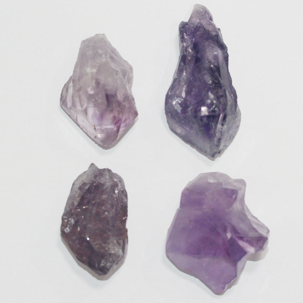 Colgante de amatista cruda 47x25 mm aprox.