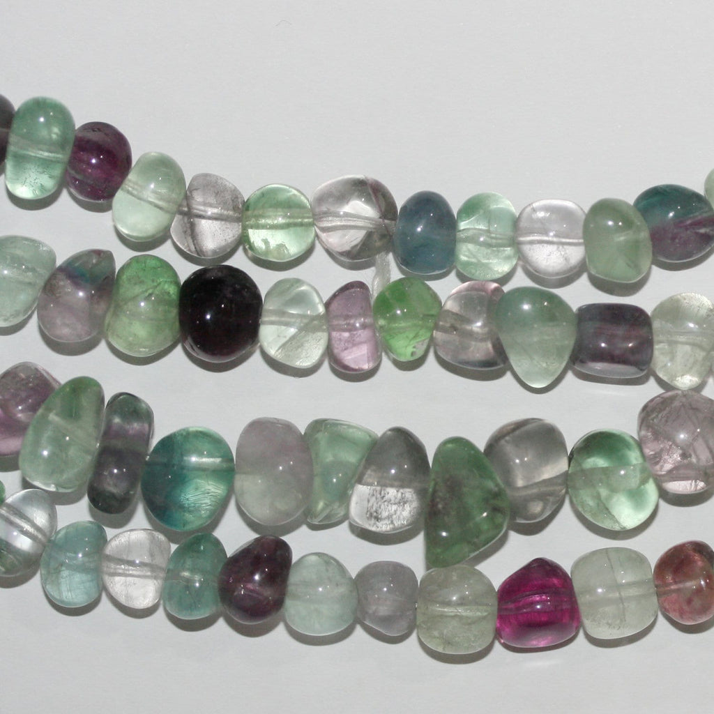 Perles de fluorite St lisses en pépites de 15 pouces (8-10 mm). Longueur approximative du fil : 39 cm.