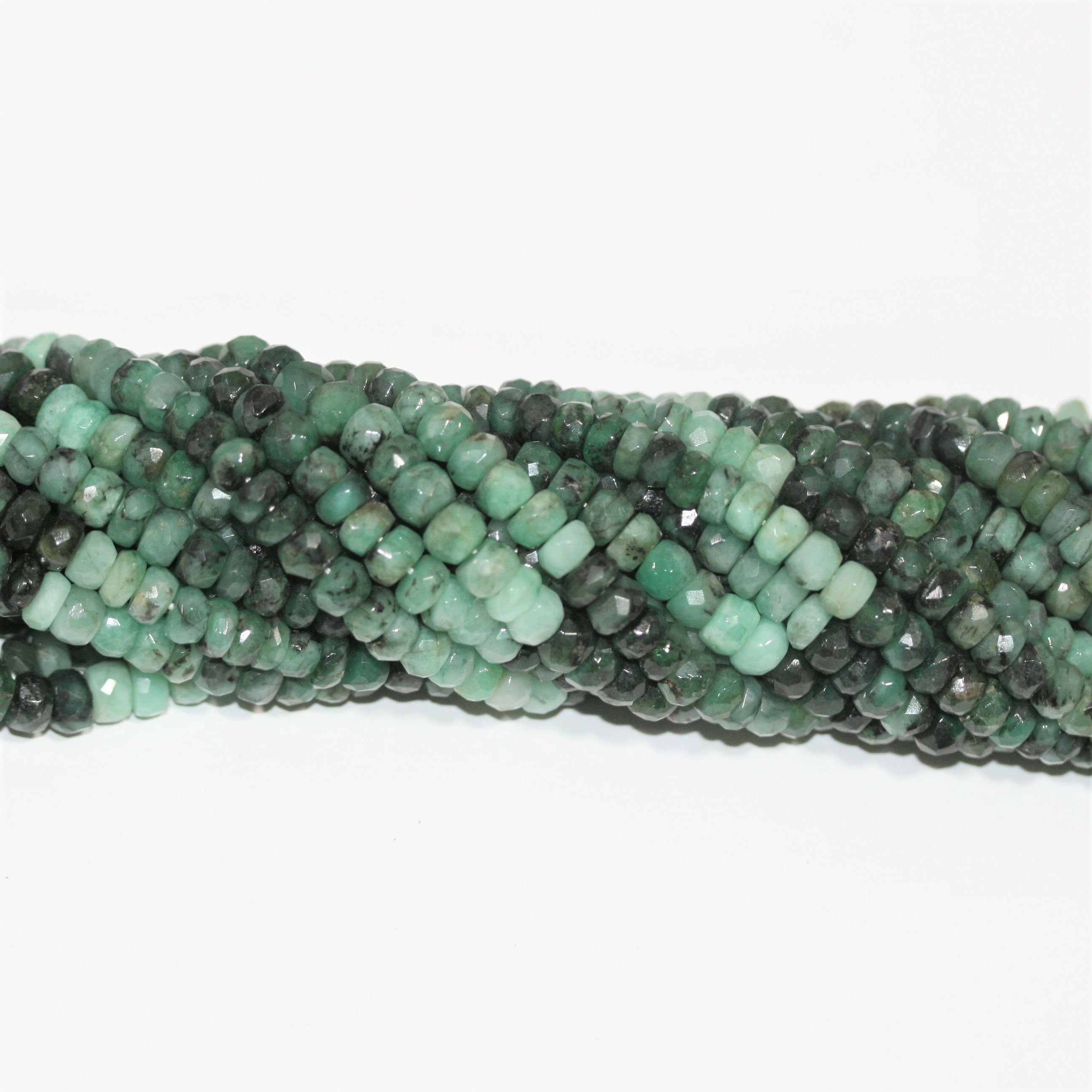 13" St Emerald Faceted Rondelle Beads 6x4mm.- Strand 33cm.