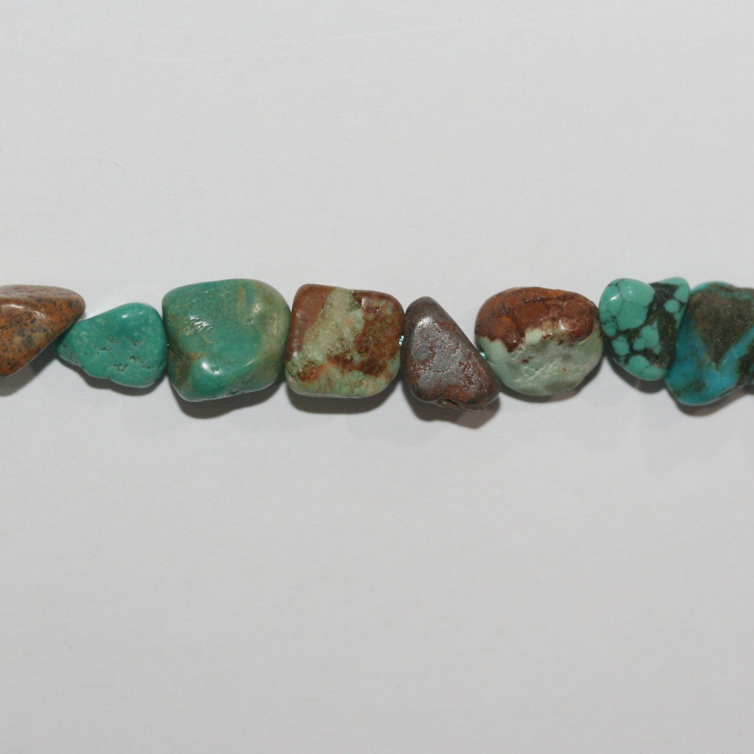 Cuentas irregulares lisas de turquesa de 16", 8-10 mm (aprox.), tira de 40 cm